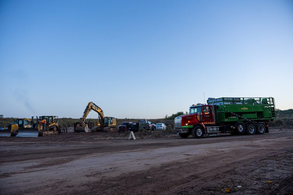 Machinery working on an active job site managed by Tidy Services