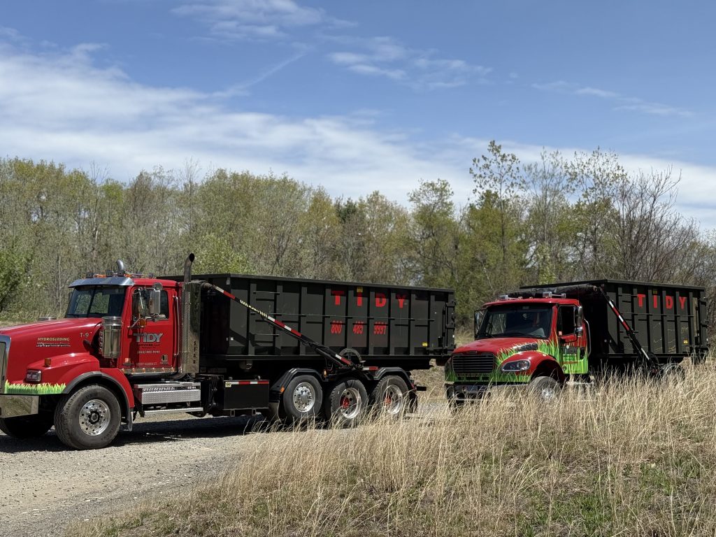 Tidy Services roll-off dumpster truck serving clients around Burlington, Connecticut